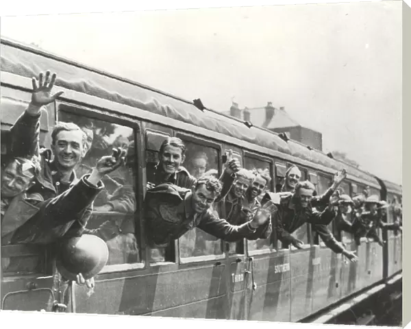 Men of the British Expeditionary Force returning from the Flanders evacuation, give