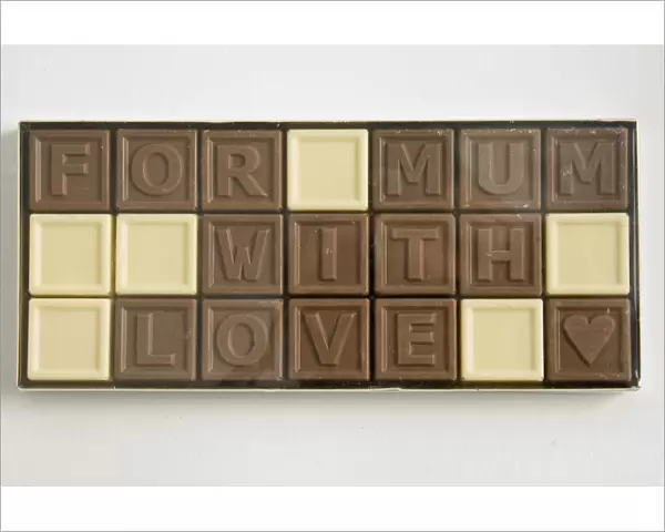 Chocolate letters spelling For Mum with love in cellophane box as Mothers day