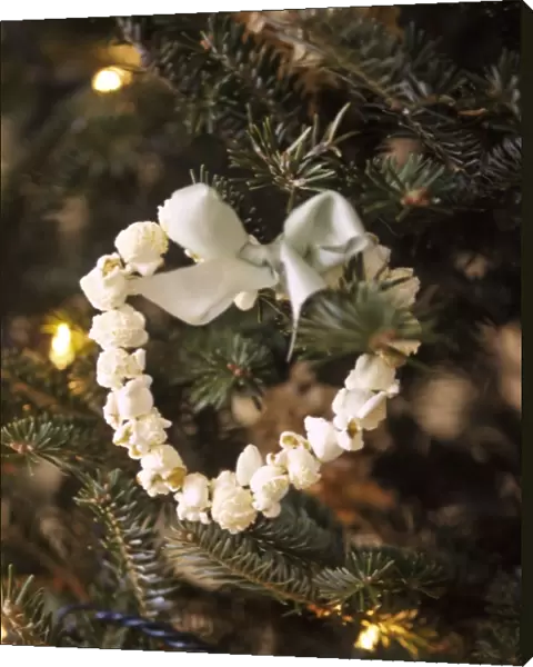 Christmas tree decoration of popped corn threaded in heart shape credit: Marie-Louise