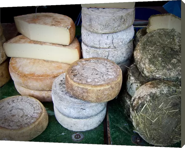 Italian cheeses on market stall in Edenbridge Kent credit: Marie-Louise Avery  / 