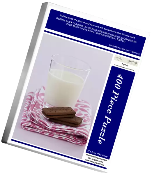 Bedtime snack of a glass of cold fresh milk with bourbon chocolate biscuits credit