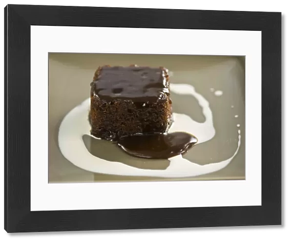Sticky toffee pudding with cream swirl credit: Marie-Louise Avery  /  thePictureKitchen