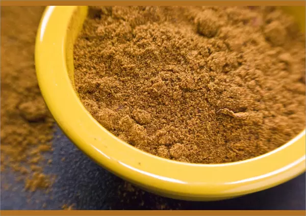 Ras-el-harnout (North African spice mixture), in small yellow bowl credit: Marie-Louise