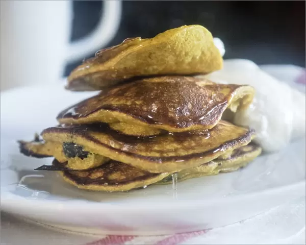 Breakfast pancakes made with a batter of a banana, two eggs, and 2 tablespoons of