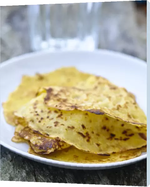 Mexican corn pancakes stacked on white plate credit: Marie-Louise Avery  /  thePictureKitchen