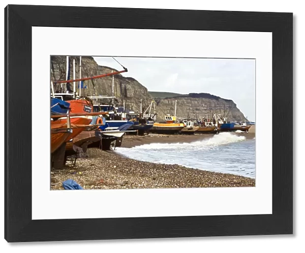 Fishing boats pulled up onto the shingle at Hastings, Sussex, UK credit: Marie-Louise