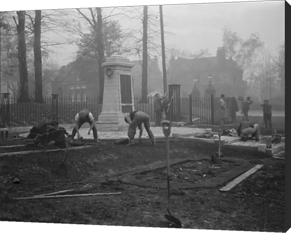 Workers finishing repair work at the Sidcup memorial, Kent. 1936