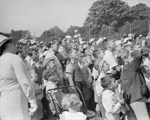 Crowds watching the Punch and Judy show at Dartford. 1937