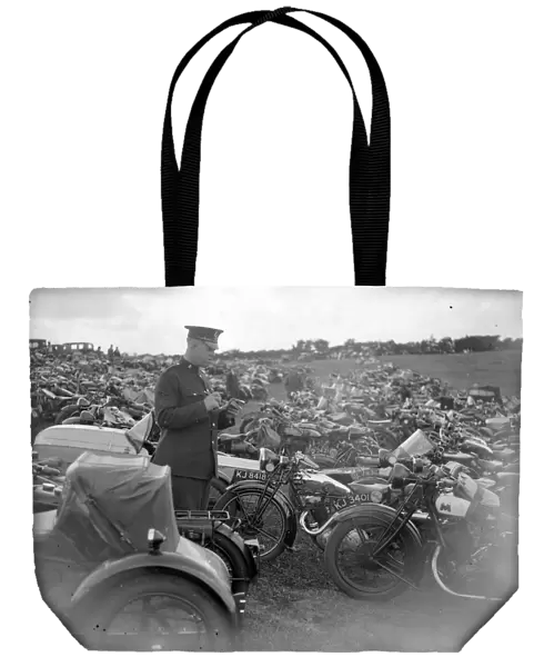 Brands Hatch near Swanley, Kent. A policeman searches for stolen motorbikes. 1933