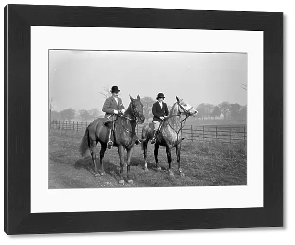 Phipps (R. A. ) and companion on horseback. 1934