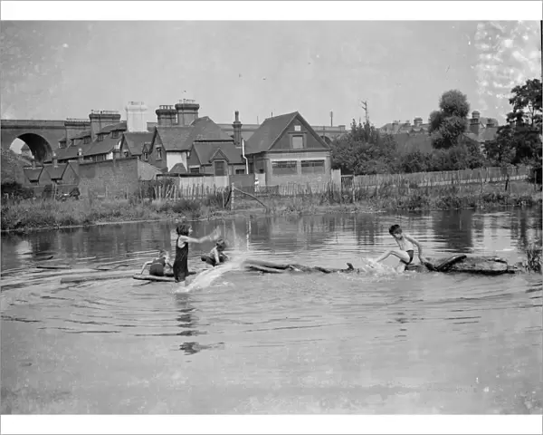 Children paddling, Orpington. 1937