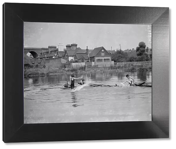Children paddling, Orpington. 1937