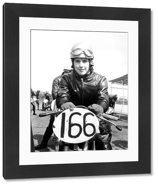 Female motorcyclist, Brenda Bound, in full leathers at a local race meeting, Kent