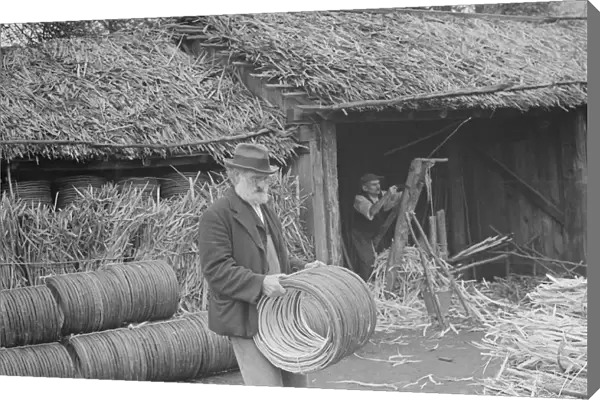 Rural farmers build basket hoops in Paddock Wood. 1936 Rural farmers build in