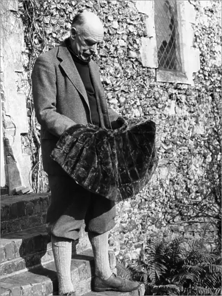 Sir Stephen Tallens seen here with a mosesk in wrap made from moles caught by him
