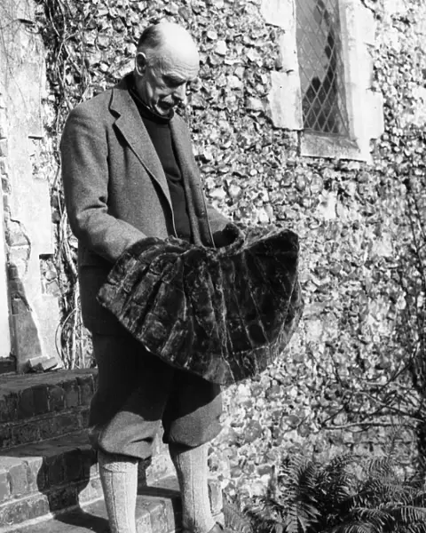 Sir Stephen Tallens seen here with a mosesk in wrap made from moles caught by him