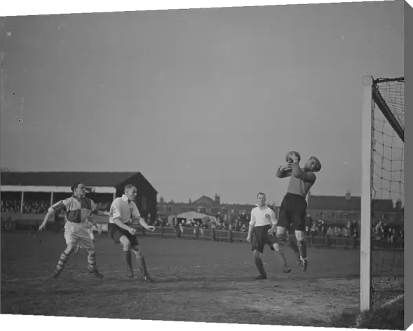 Football match; Erith and Belvedere versus Maidenhead. The goalie makes a save