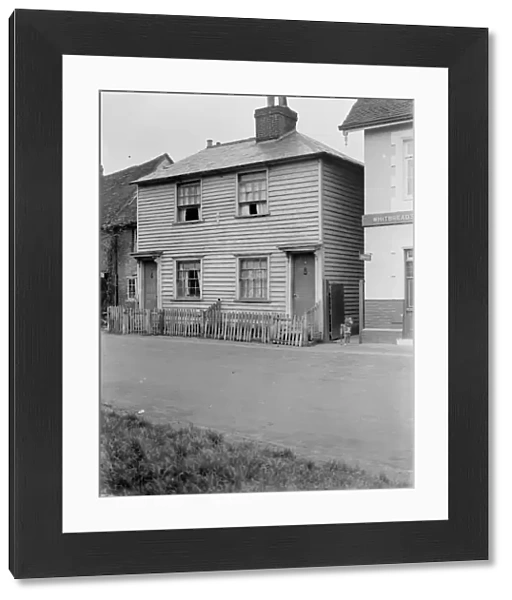 Weather board cottage on the street in Eynsford, Kent. 1937