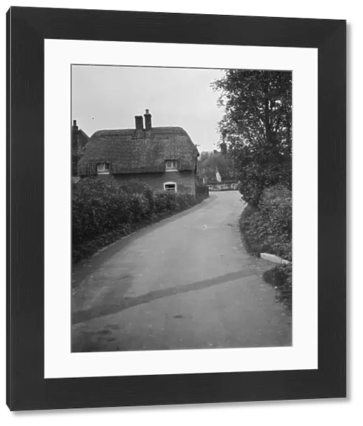 A thatched cottage at Womenswold village near Canterbury, Kent. 1937