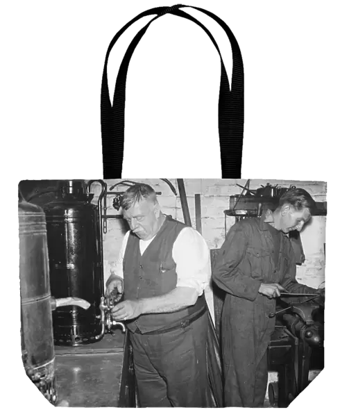 Gravesend Gasworks in Kent. Men working in the fitting shop. 1939