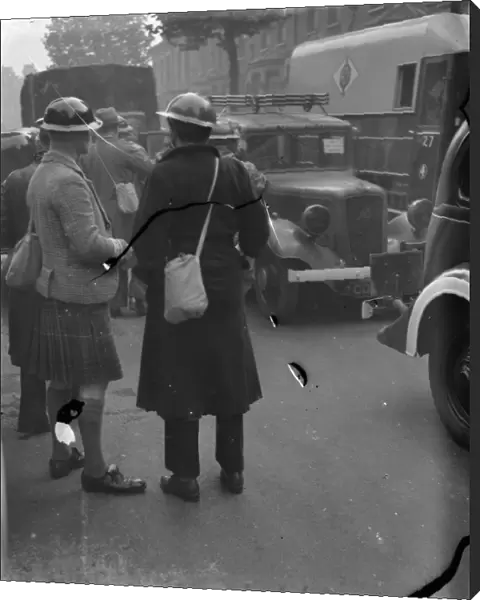 Air Raid Precaution exercise on Old Kent Road in London. A kilted man is amongst