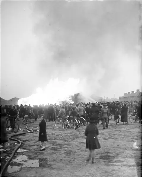 Crowds turn out to see the timber fire at Welling in Kent. 1938