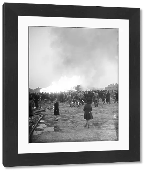 Crowds turn out to see the timber fire at Welling in Kent. 1938