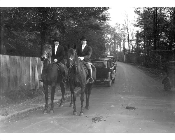 Mr Gook and Miss Henry on horseback. 1933