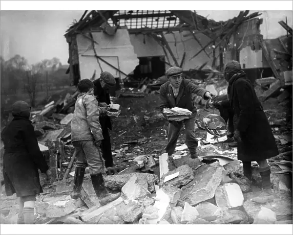 Home Front 1940 Salvaging school books at a bombed Northfleet school, Kent