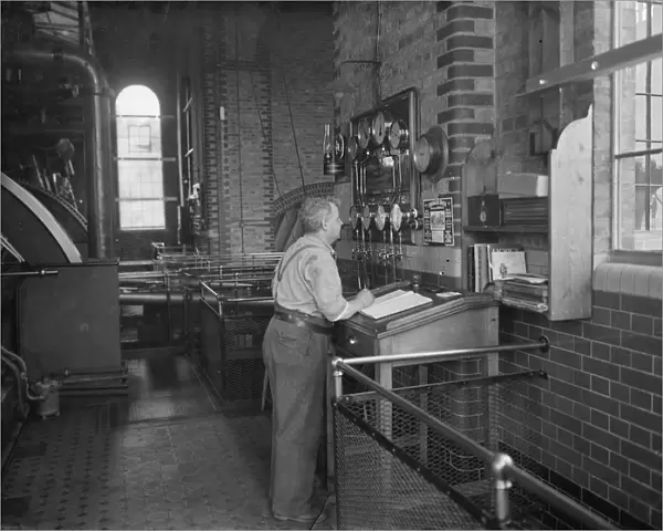 Gravesend Water Works in Kent. A worker in the control room. 1939