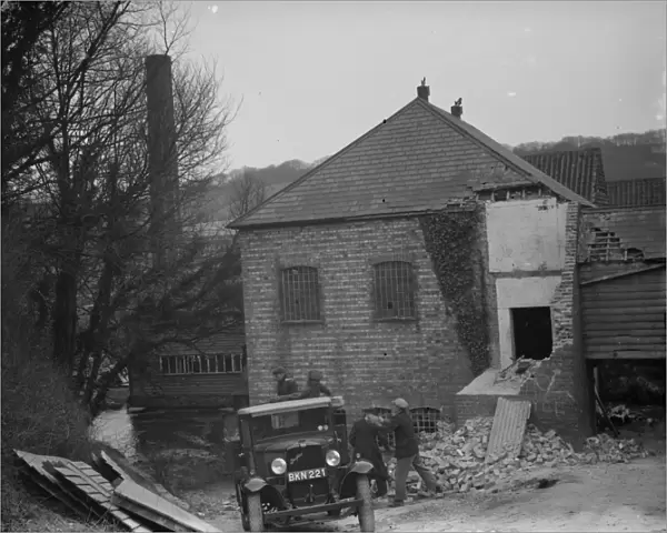 Workmen demolishing the old paper mill at Shoreham, Kent with a Bedford lorry out