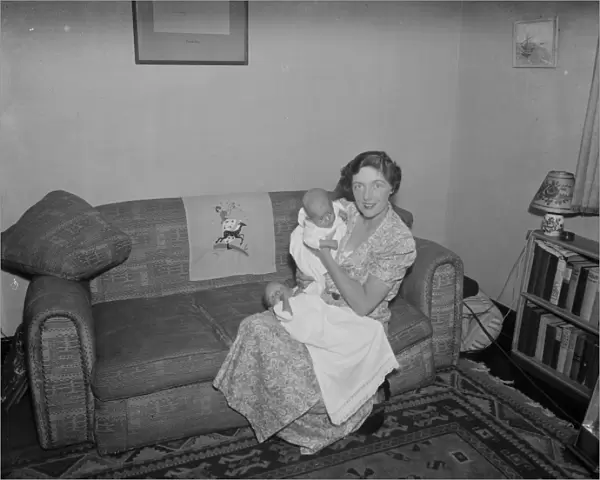 Mrs Herbert with her twin sons, North Cray, Kent. 1937