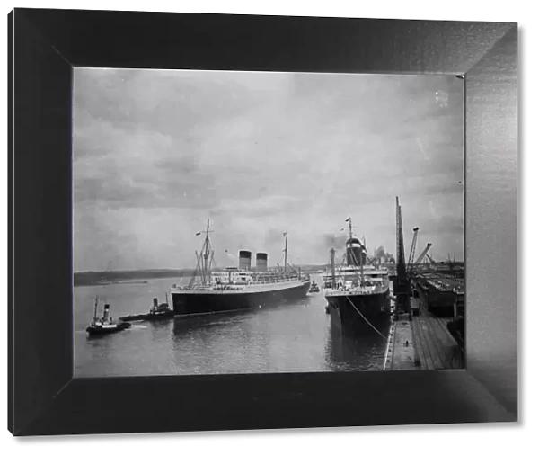 Mauretania (left) leaving America to dock at Southampton. 1947[?]