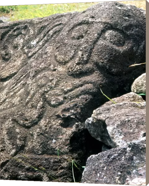 Easter Island - Orongo petroglyphs, including a humanoid face, on the sacred rocks