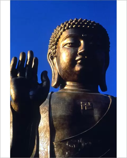 Buddhism The largest cast metal statue of Buddha in the world in Lantau Island at
