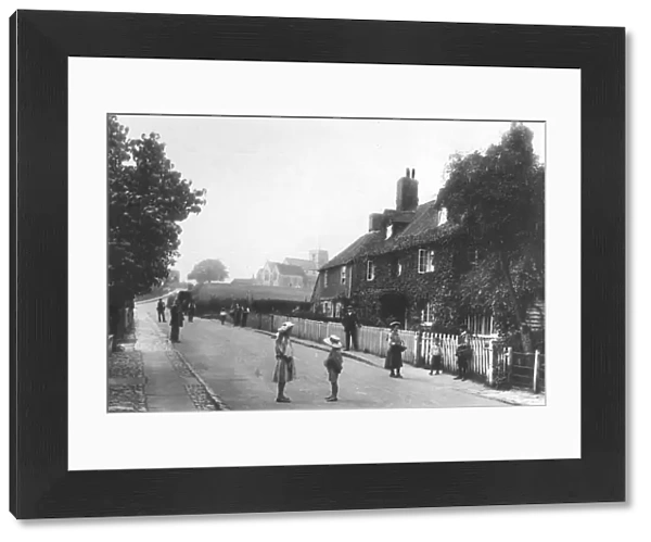 A street scene from 1907 of Great Chart, Ashford, Kent, children playing in the