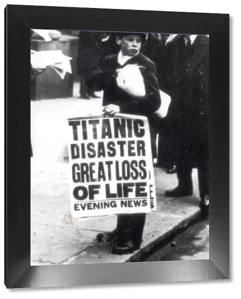 A newspaper boy spreads the news of the sinking of the Titanic to bystanders outside
