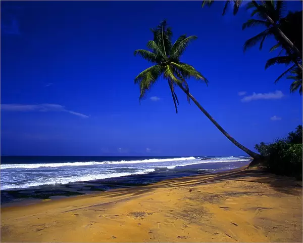 Beach, with its distinctive warm-coloured sand, north of Galle, and south of Welligama