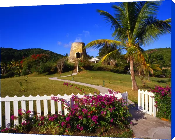 West Indies. Antigua. Converted sugar mill, above Hawksbill bay