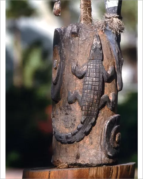 POLYNESIAN MYTHOLOGY Polynesian wooden magical statue, of a lizard, carved on the