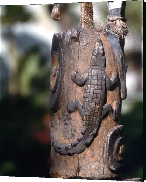 POLYNESIAN MYTHOLOGY Polynesian wooden magical statue, of a lizard, carved on the