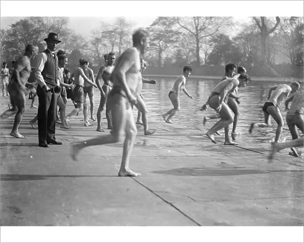 Sunbathers rushing to dive into the water. 1933