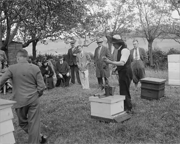 Parson beekeeper giving a demonstration. 1935