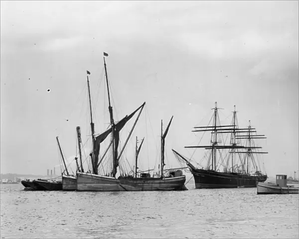 Thames Barges moored next to The Cutty Sark on the River Thames off Greenhithe, Kent