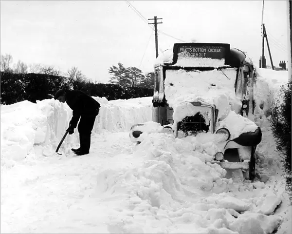 Snow up on the roof of this bus at Cudham, Kent. Two other buses suffered the same fate