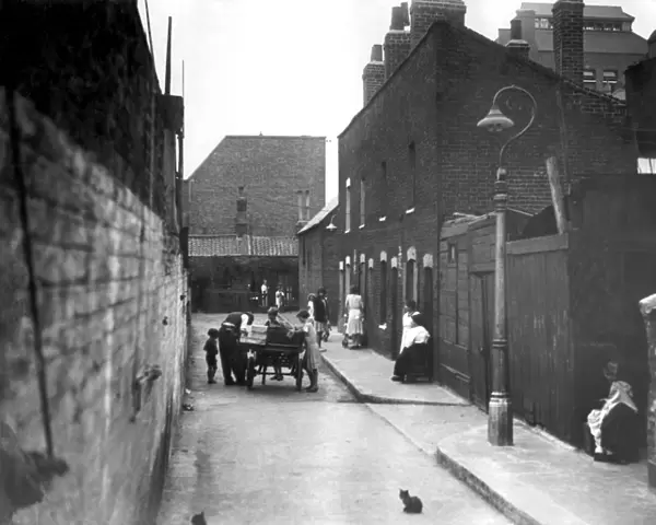 A slum Street in Limehouse in the early 1930 s. Many such places did not survive