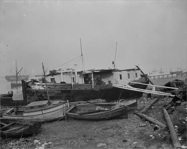 The barge Mocking Bird at low tide at Gravesend Reach, Kent. 1938
