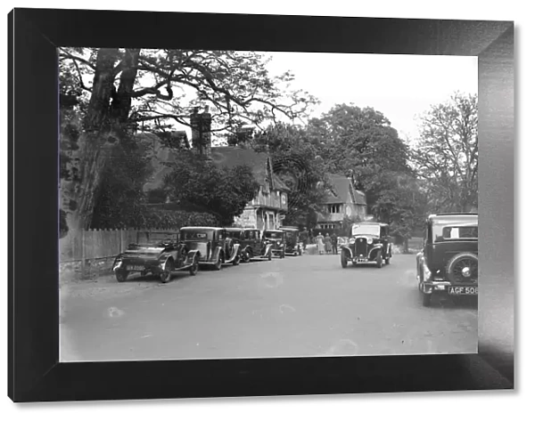Cars in the village in Kent. 1933