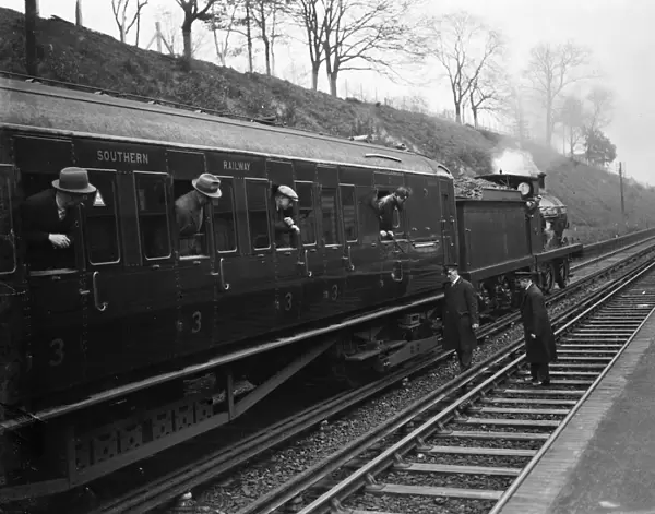 Testing electrified railway lines by steam train in Swanley, Kent. 1938