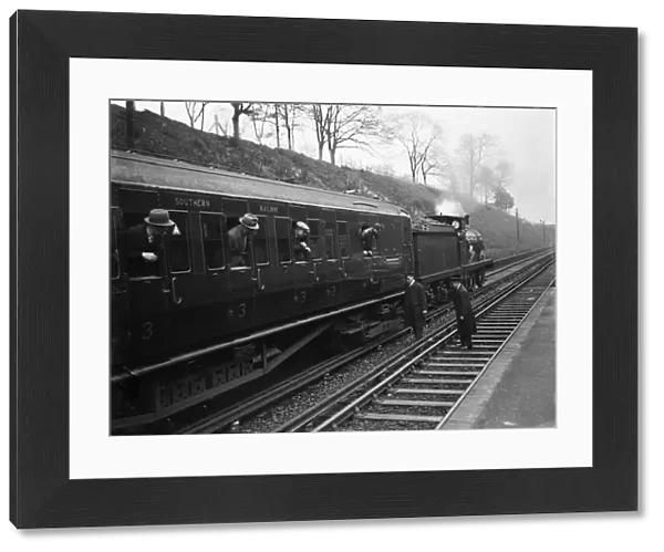 Testing electrified railway lines by steam train in Swanley, Kent. 1938